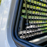 close up of the gas strut on an installed gullwing window troopy